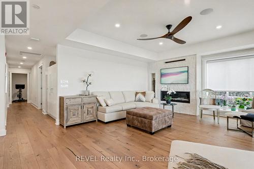 101 - 10 Dalhousie Avenue, St. Catharines (Port Dalhousie), ON - Indoor Photo Showing Living Room With Fireplace