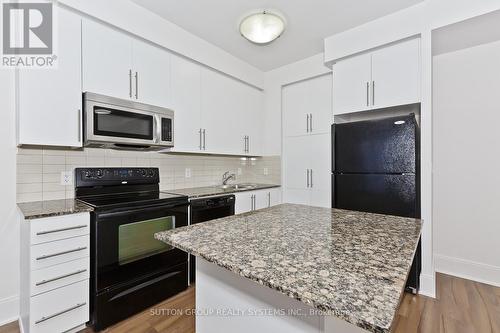 1605 - 330 Burnhamthorpe Road W, Mississauga, ON - Indoor Photo Showing Kitchen