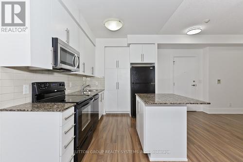 1605 - 330 Burnhamthorpe Road W, Mississauga, ON - Indoor Photo Showing Kitchen With Upgraded Kitchen