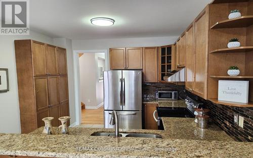 24 Cozens Drive, Richmond Hill, ON - Indoor Photo Showing Kitchen With Double Sink