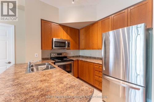 110 - 11121 Yonge Street, Richmond Hill, ON - Indoor Photo Showing Kitchen With Double Sink