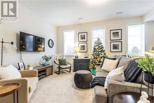 8 - 219 Dundas Street E, Hamilton, ON - Indoor Photo Showing Living Room