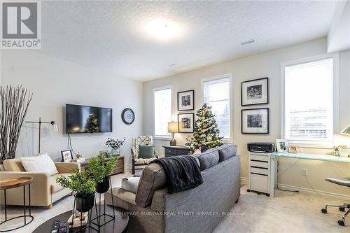 8 - 219 Dundas Street E, Hamilton, ON - Indoor Photo Showing Living Room