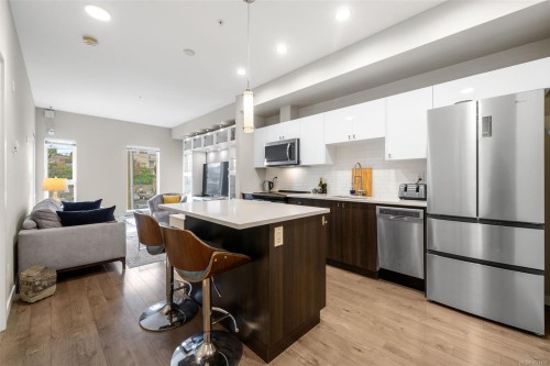404-767 Tyee Rd, Victoria, BC - Indoor Photo Showing Kitchen With Stainless Steel Kitchen With Upgraded Kitchen