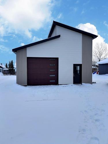 Garage - 315 Rue D'Évain, Rouyn-Noranda, QC - Outdoor With Exterior