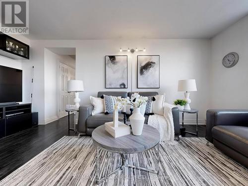 817 - 5 Parkway Forest Drive N, Toronto, ON - Indoor Photo Showing Living Room