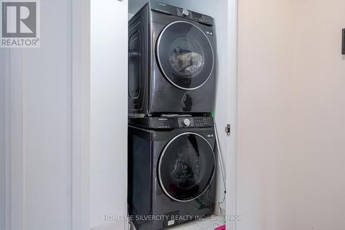 712 - 18 Lee Centre Drive, Toronto, ON - Indoor Photo Showing Laundry Room