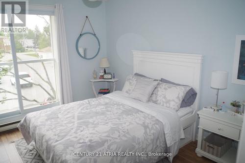 24 - 4 Paradise Boulevard, Ramara, ON - Indoor Photo Showing Bedroom