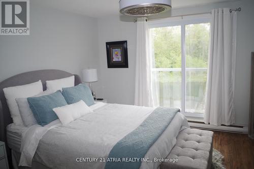 24 - 4 Paradise Boulevard, Ramara, ON - Indoor Photo Showing Bedroom