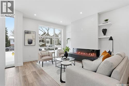 1139 13Th Street E, Saskatoon, SK - Indoor Photo Showing Living Room With Fireplace