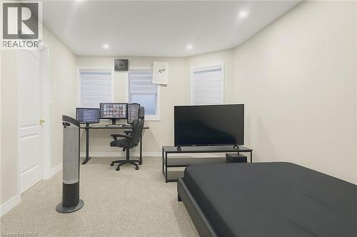 Bedroom featuring light carpet, an office area, and recessed lighting - 235 Pineland Court Unit# Upper, Waterloo, ON - Indoor