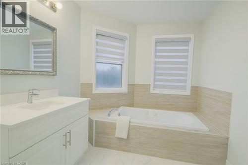 Full bathroom with vanity and a bath - 235 Pineland Court Unit# Upper, Waterloo, ON - Indoor Photo Showing Bathroom