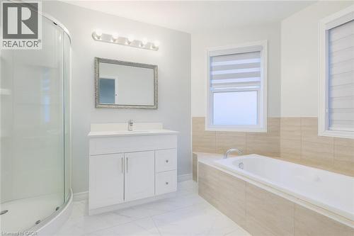 Full bath with vanity, light marble finish floors, a shower stall, and a bath - 235 Pineland Court Unit# Upper, Waterloo, ON - Indoor Photo Showing Bathroom