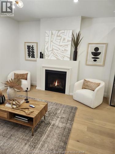 82 Mulberry Court, Amherstburg, ON - Indoor Photo Showing Living Room With Fireplace