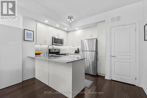 Th4 - 120 Long Branch Avenue, Toronto, ON - Indoor Photo Showing Kitchen With Stainless Steel Kitchen With Upgraded Kitchen