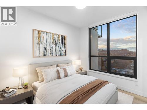 Virtually staged 2nd bedroom - 1488 Bertram Street Unit# 1005, Kelowna, BC - Indoor Photo Showing Bedroom