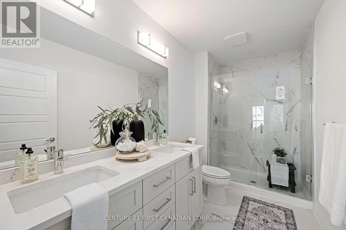 Ensuite with glass shower - 203 - 1560 Upper West Avenue, London South (South B), ON - Indoor Photo Showing Bathroom