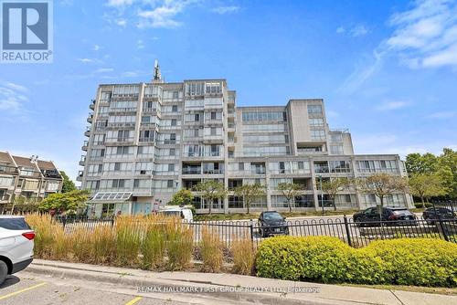 701 - 25 Cumberland Lane, Ajax, ON - Outdoor With Balcony With Facade