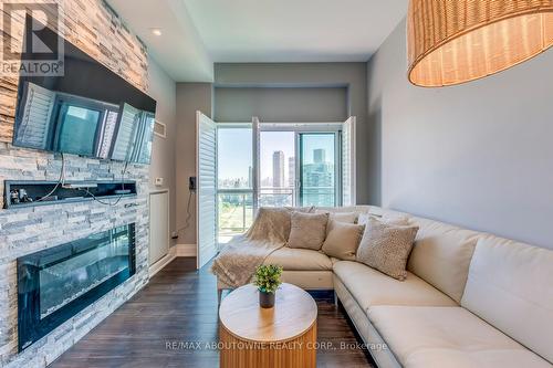 2524 - 165 Legion Road N, Toronto, ON - Indoor Photo Showing Living Room With Fireplace