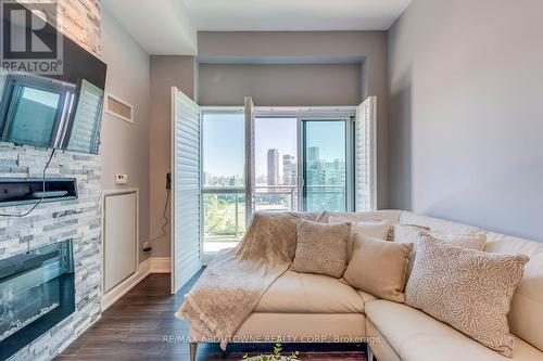 2524 - 165 Legion Road N, Toronto, ON - Indoor Photo Showing Living Room With Fireplace
