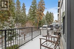 Seamless flow to your private deck overlooking mature trees and peaceful green space. - 