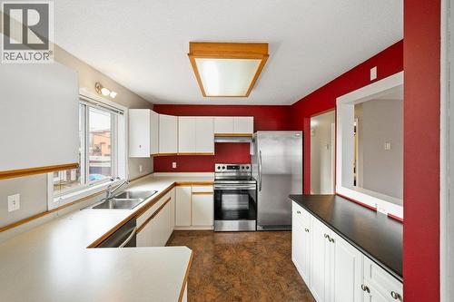 6201 Maple Drive Unit# 206, Osoyoos, BC - Indoor Photo Showing Kitchen With Double Sink