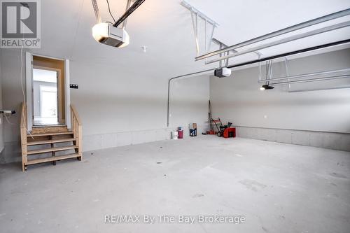 30 Misty Ridge Road, Wasaga Beach, ON - Indoor Photo Showing Garage