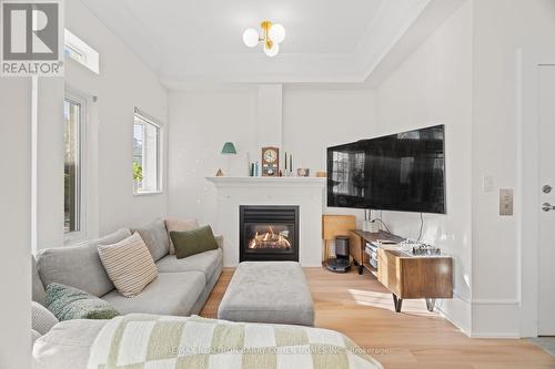 201 - 336 Davenport Road, Toronto, ON - Indoor Photo Showing Living Room With Fireplace
