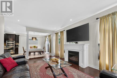 61 Aldersgate Drive, Brampton, ON - Indoor Photo Showing Living Room With Fireplace