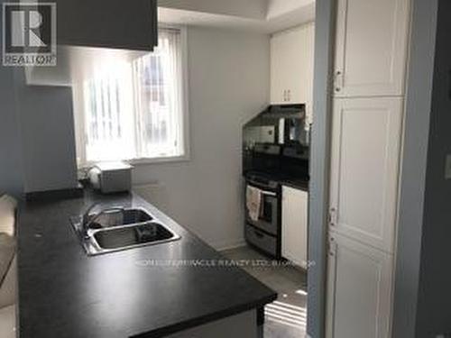 65 - 5650 Winston Churchill Boulevard, Mississauga, ON - Indoor Photo Showing Kitchen With Double Sink