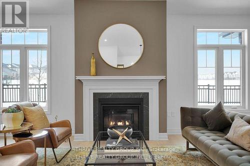 15 - 1080 Upperpoint Avenue, London South (South B), ON - Indoor Photo Showing Living Room With Fireplace
