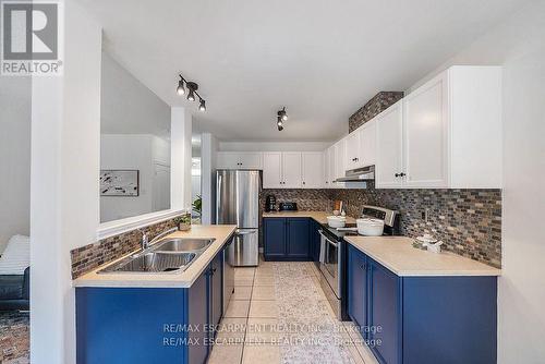 4 - 10 Liddycoat Lane, Hamilton, ON - Indoor Photo Showing Kitchen With Double Sink With Upgraded Kitchen