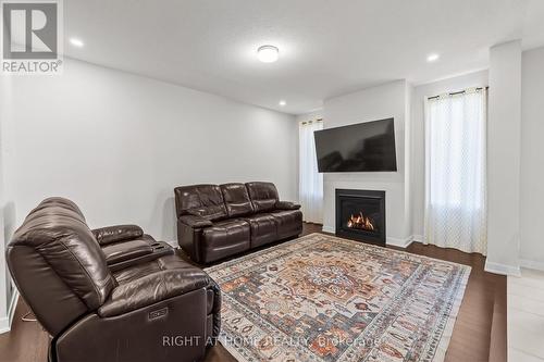 837 Derreen Avenue, Ottawa, ON - Indoor Photo Showing Living Room With Fireplace