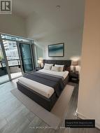 Primary bedroom with private balcony - 