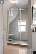 Large walk-in shower with glass doors - 