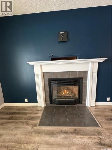 801 5Th Avenue, Whitewood, SK - Indoor Photo Showing Living Room With Fireplace