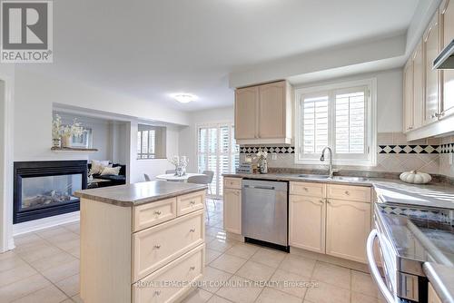 108 Kirkbride Crescent, Vaughan, ON - Indoor Photo Showing Kitchen With Fireplace With Double Sink