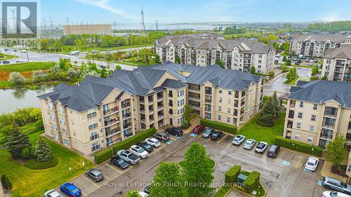 311 - 1491 Maple Avenue, Milton (De Dempsey), ON - Outdoor With Balcony With Facade With View