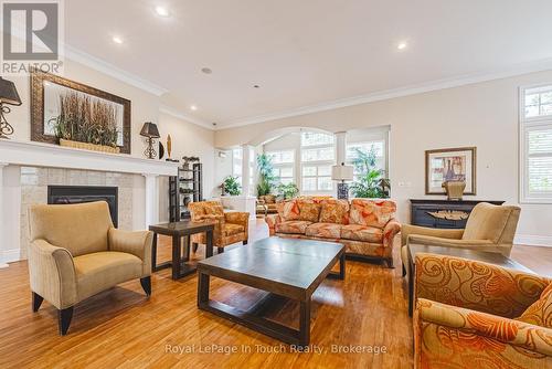 311 - 1491 Maple Avenue, Milton (De Dempsey), ON - Indoor Photo Showing Living Room With Fireplace