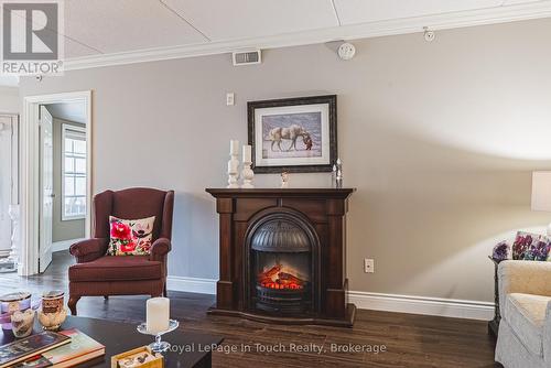 311 - 1491 Maple Avenue, Milton (De Dempsey), ON - Indoor Photo Showing Other Room With Fireplace