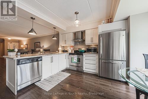 311 - 1491 Maple Avenue, Milton (De Dempsey), ON - Indoor Photo Showing Kitchen With Stainless Steel Kitchen With Upgraded Kitchen