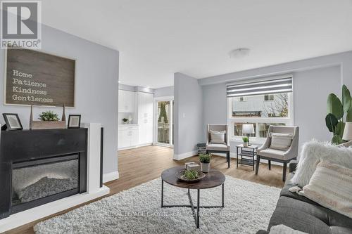 79 Winding Meadow Court, Kitchener, ON - Indoor Photo Showing Living Room With Fireplace