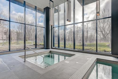 Hot tub - 2706-1000 Rue André-Prévost, Montréal (Verdun/Île-Des-Soeurs), QC - Indoor Photo Showing Other Room With In Ground Pool