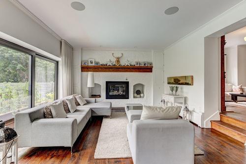 Family room - 112 Av. Cornwall, Mont-Royal, QC - Indoor Photo Showing Living Room With Fireplace