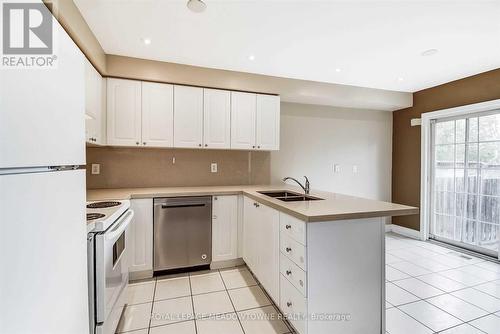 1470 Pate Court, Mississauga, ON - Indoor Photo Showing Kitchen With Double Sink
