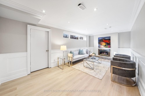 Bsmt-217 Altamira Road, Richmond Hill, ON - Indoor Photo Showing Living Room With Fireplace