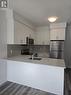 208 - 1100 Lackner Place, Kitchener, ON  - Indoor Photo Showing Kitchen 