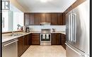 Upper - 17 Yellowknife Road, Brampton, ON  - Indoor Photo Showing Kitchen With Stainless Steel Kitchen With Double Sink 