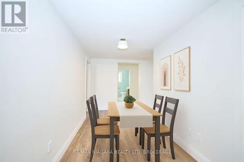 virtually staged photos - Unit 3 - 141 Plymouth Road, Welland (Lincoln/Crowland), ON - Indoor Photo Showing Dining Room
