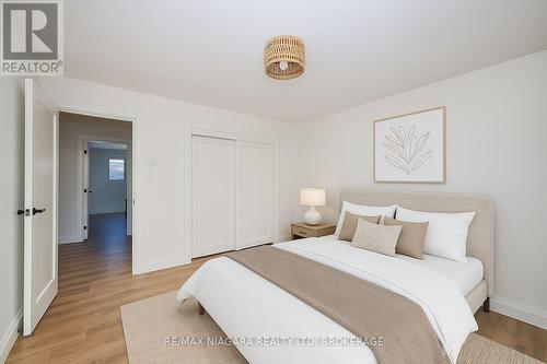 virtually staged photos - Unit 3 - 141 Plymouth Road, Welland (Lincoln/Crowland), ON - Indoor Photo Showing Bedroom